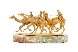 Asprey, a silver gilt model of four racing camels with jockeys up by Asprey & Co., London 1982, the