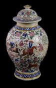 A large Qajar type vase and cover, painted in bright colours, 51cm high Provenance: Purchased