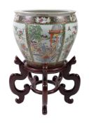 A large Chinese Cantonese style jardiniÃ¨re, 20th century, painted with alternating panels of