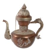 A Tibetan silver metal and copper ewer, 20th century, 28cm high