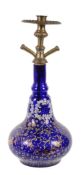 A Bohemian or Beykoz blue glass hookah base, made for the Near Eastern market , enamelled in white