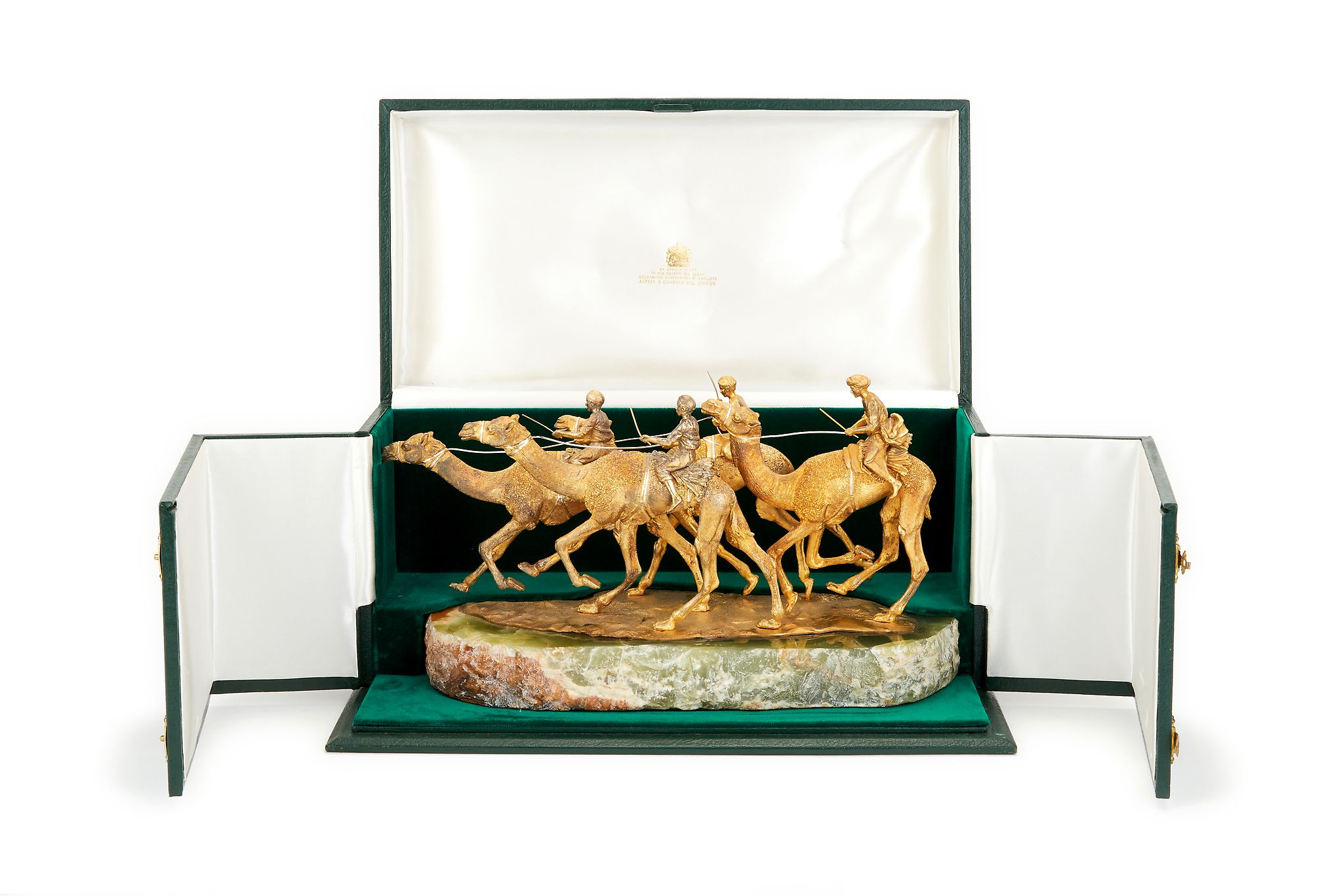 Asprey, a silver gilt model of four racing camels with jockeys up by Asprey & Co., London 1982, the - Image 2 of 2