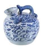 A Chinese blue and white ewer, 17th century, the ovoid body with zoomorphic overhead handle and