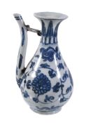 A Chinese blue and white ewer, late Ming Dynasty, the pear-shaped body of the ewer painted with a