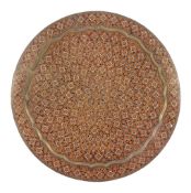 A large Middle Eastern circular tray, circa 1900 or later, with enamel decoration, with hook for