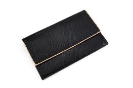 Asprey, a black lizard travel wallet, the rectangular wallet with a magnetic fold over flap with