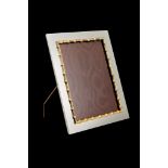 Gucci, an electro-plated photo frame, with a gilt bamboo border and a wood easel back, 31cm (12 1/
