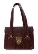 Aspinal, a brown leather handbag, the brown leather crocodile effect bag with double strap handles,