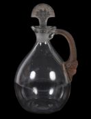 Lalique, Rene Lalique for Cusenier, Satyre, a clear, frosted and brown stained decanter or carafe