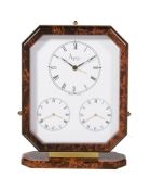 Asprey, a gilt metal and brown lacquer triple time zone alarm desk clock, three quartz movements,