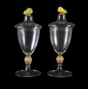 A pair of large modern Venetian clear glass goblets and covers, the round funnel bowls supported on
