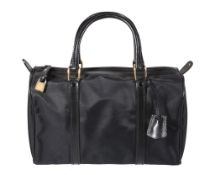 Asprey, a black canvas tote bag, with double rolled leather handles, the interior with a zip