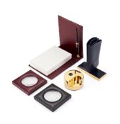 Asprey, a collection of desk items, to include: a purple leather notepad, the cover stamped You