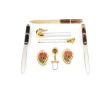 A collection of desk accessories, to include: three letter openers, with horn handles, two with