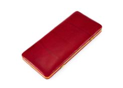 Ω Asprey, a red lizard and gilt metal manicure case, opening to a nine piece manicure set by