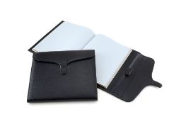 Smythson, a black leather writing folder, the square black leather folder with a fold over clasp,