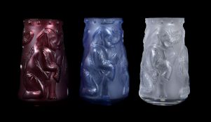 Lalique, Cristal Lalique, Baby Elephants (Elephanteaux), three vases in clear, red and blue part