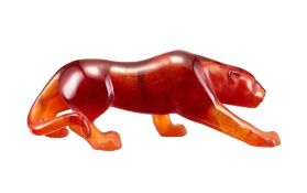 Daum, Panthere, an amber pate de verre model of a panther, engraved mark, 22cm long, in a Daum card