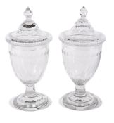 Asprey, William Yeoward, a pair of cut glass urn shape vases and covers, late 20th century, etched