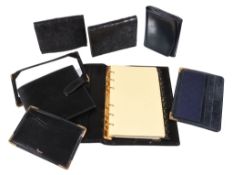 Asprey, a gentleman's four piece accessory set, to include: a black leather address book, 17.4 x