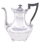 A silver oblong baluster coffee pot by James Dixon & Sons Ltd, Sheffield 1911, with a black