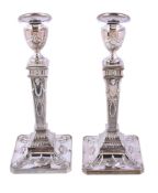 A pair of silver Adam style candlesticks by Barker Ellis Silver Co., Birmingham 1988, with bead