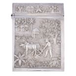 An Indian silver rectangular card case, Calcutta, late 19th century, chased with rural scenes, of a