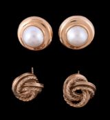 A pair of mabe pearl earrings, the mabe pearls in a polished surround, with post fittings, stamped