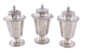 A set of three Indian colonial silver pedestal salt and pepper casters by George Gordon & Co.,