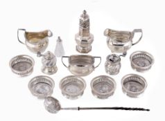 A collection of small silver, including: a silver mounted cut glass cayenne pepper pot by John