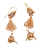 A pair of gold coloured ear pendants, the pear shaped pediments above pierced panels, to tassel