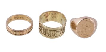 Three gold coloured rings, the first a signet ring, finger size I; the second a band ring with