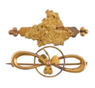 A late 19th century South African gold prospector's brooch, the gold nugget on a polished bar with