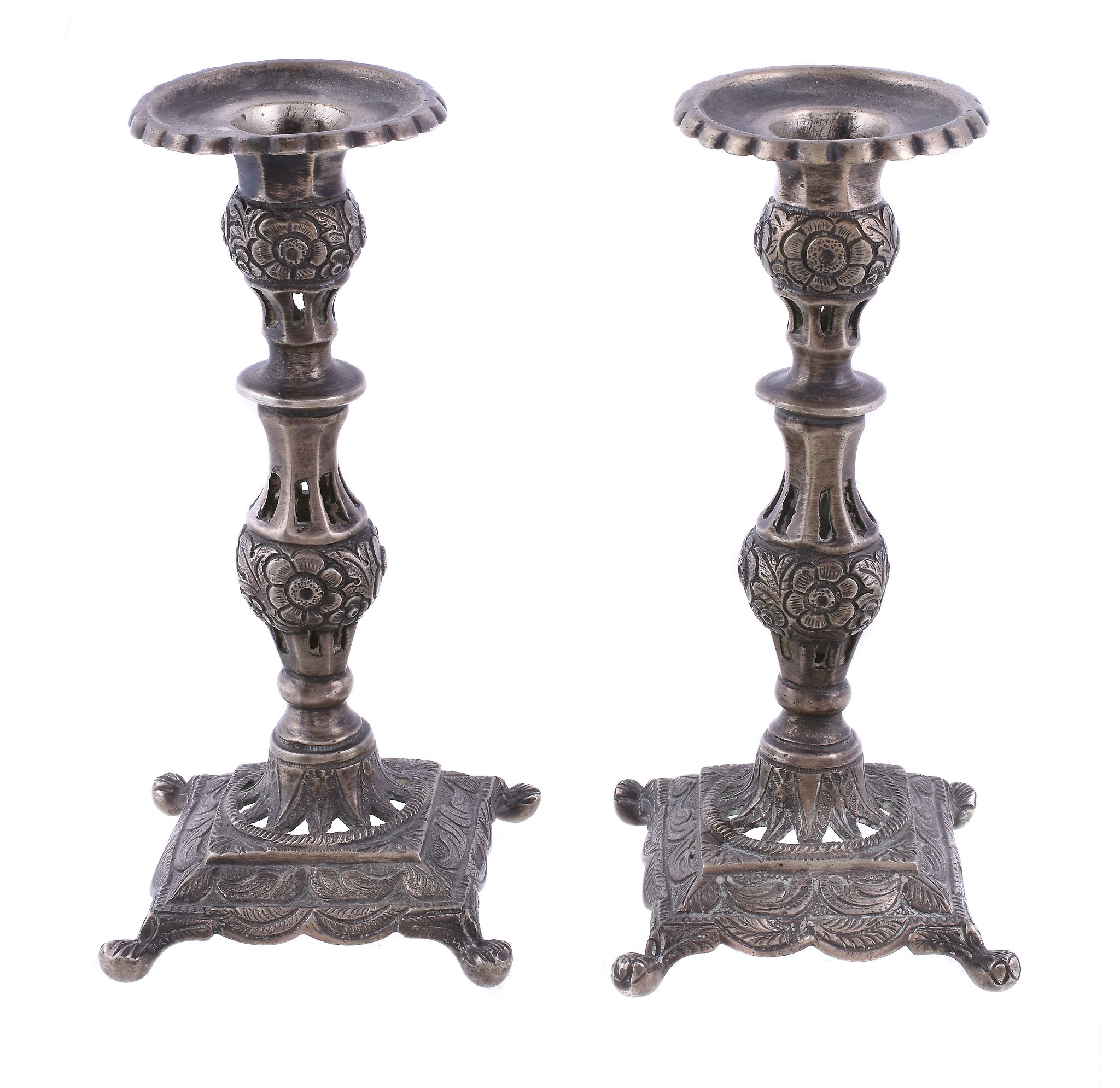 A pair of Continental small candlesticks, each with two indistinct marks, perhaps Portuguese circa