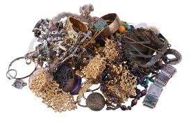 A collection of costume jewellery, including various necklaces, brooches, and other items