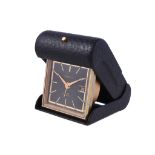 Gubelin, a gilt metal and leather travelling alarm clock, Swiss 8 day alarm movement, 15 jewels,