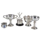 [Golf] Five silver small trophies, comprising: a crossed golf clubs stand for a hole-in-one ball by