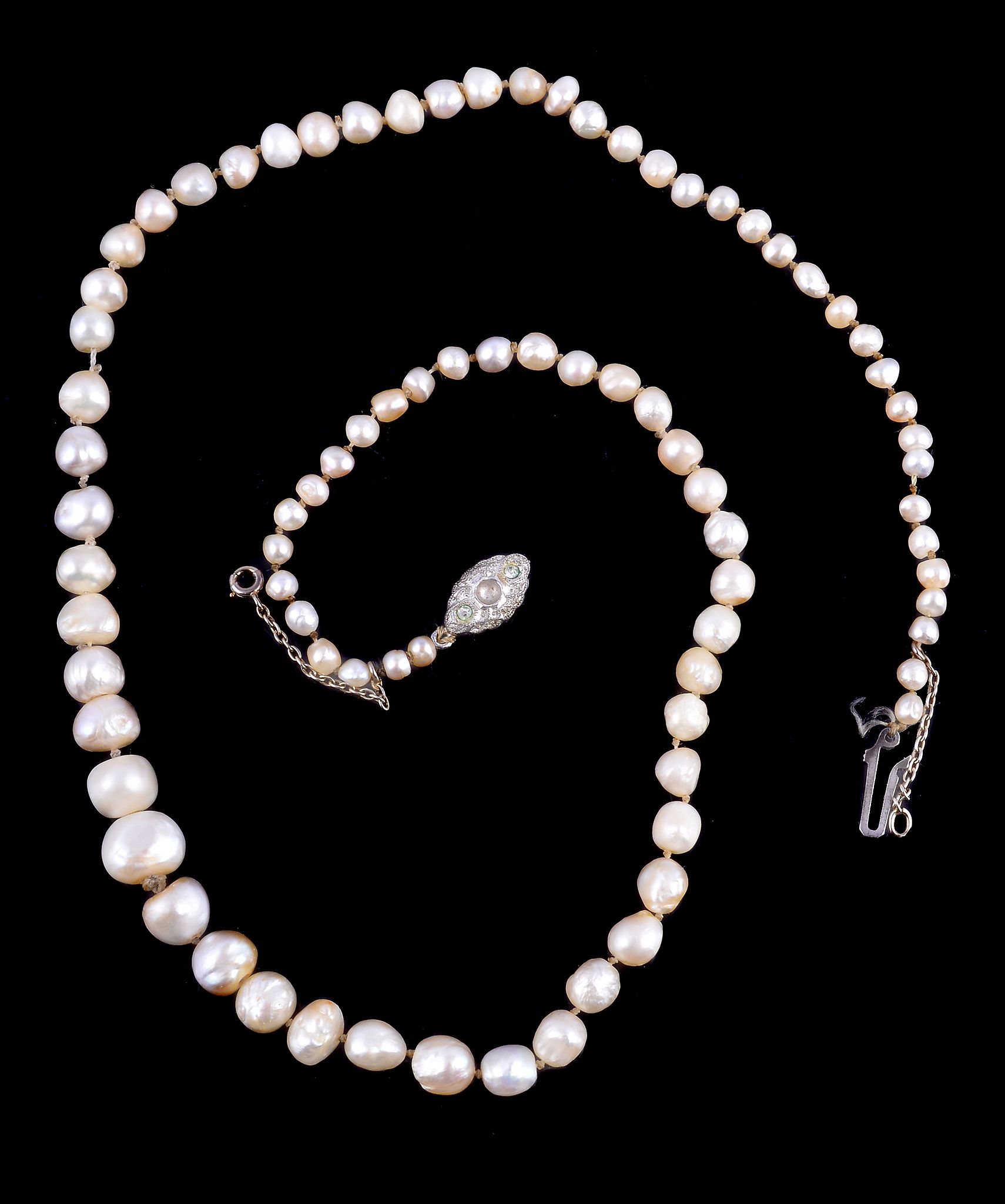 A graduated natural and cultured pearl necklace, the eighty three slightly baroque shaped pearls to