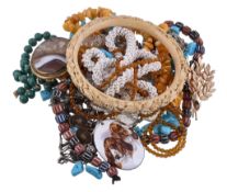 Ω A collection of antique and later costume jewellery, to include a Victorian ivory bangle,