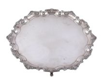 A silver shaped circular salver, maker's mark M (not traced), Birmingham 1967, the raised moulded
