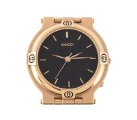 Gucci, ref. 0900, a gilt metal travel alarm desk clock, no. 0001852, Swiss quartz movement, 1