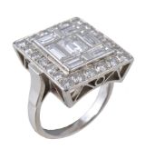 A 1950s diamond panel ring, the rectangular panel with a central step cut diamond with canted