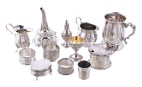 A collection of small silver, including: an Edwardian drum mustard pot, London 1901; three napkin