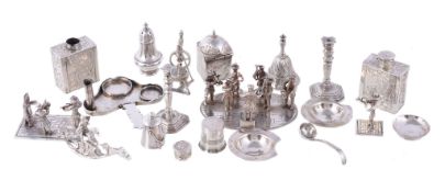 A collection of Dutch silver miniatures or toys, including: a group of musicians on an oval base,