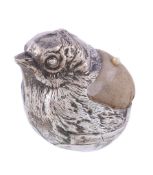 A silver novelty pin cushion in the form of a hatching chick by Sampson Mordan & Co., Chester 1907,