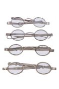 Four spectacles, comprising: one George III silver by James Davenport, London 1803 (maker' mark and