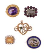 Four antique brooches, the first a Victorian amethyst brooch, circa 1860, the oval cut amethyst