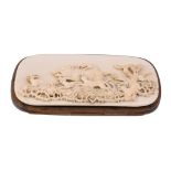 Ω An ivory and gilt metal rounded rectangular spectacles case, circa 1880, the upper cover carved