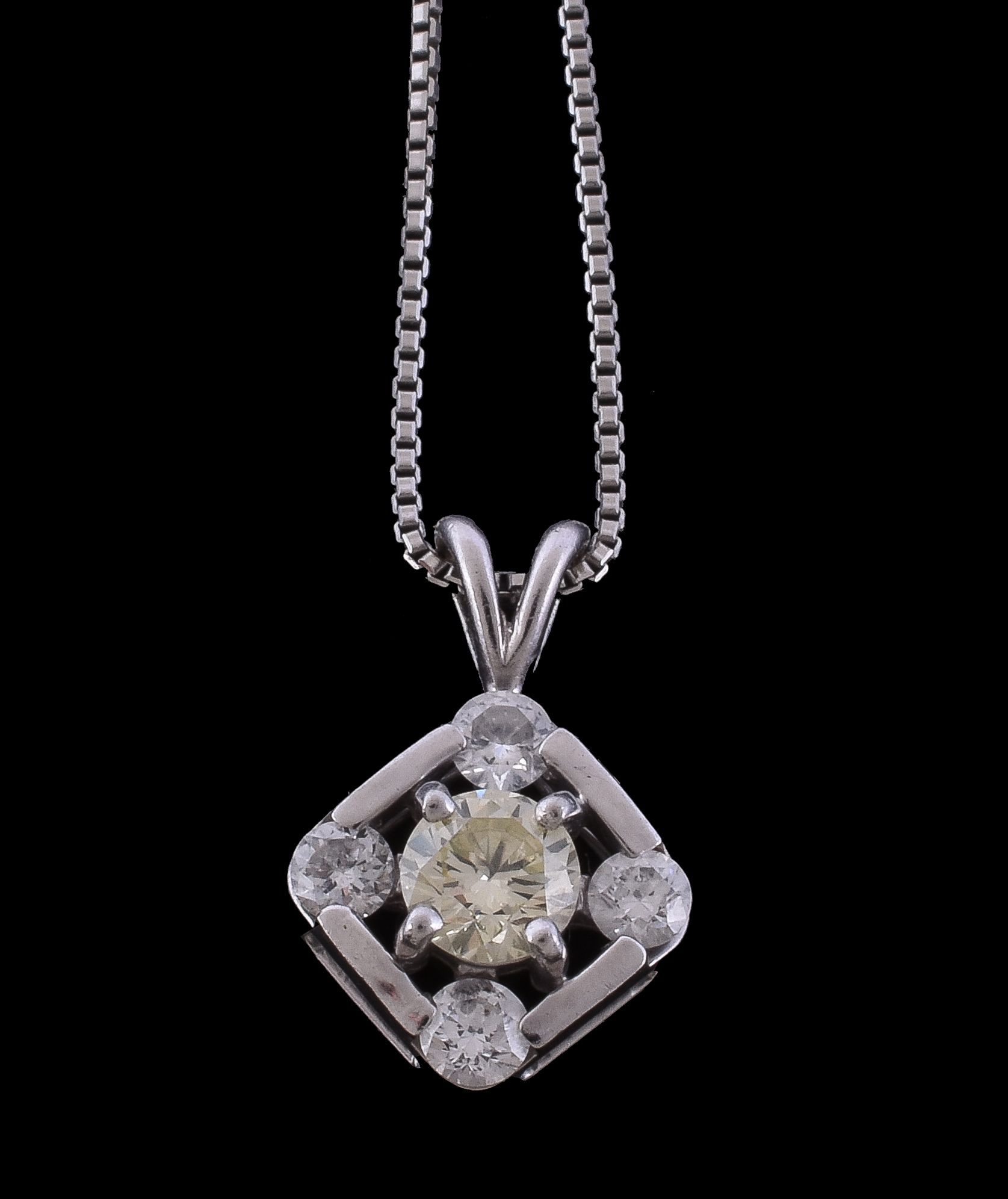 A diamond pendant, the squared pendant with brilliant cut diamonds at the cardinal points and a