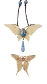 An Art Nouveau carved horn pendant, circa 1905, carved in the form of a butterfly, with an oval